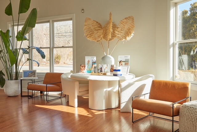 The sunlit waiting area at Refine Medical and Aesthetics in Westbrook, Connecticut
