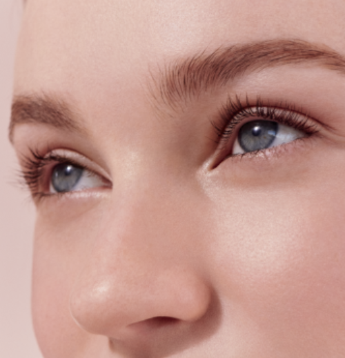 Close-up of a woman’s eyes and even-toned skin